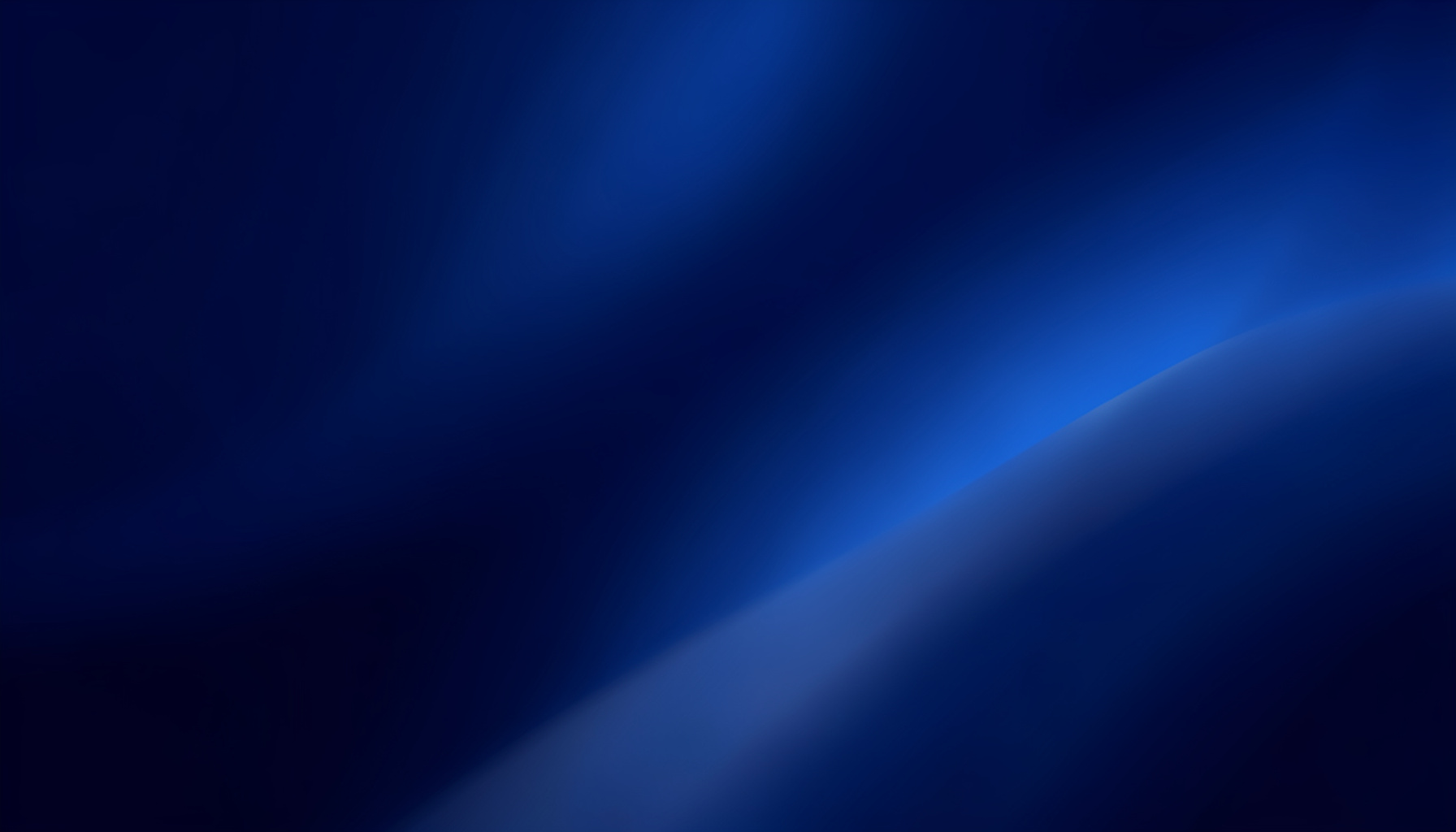 Wide abstract banner in deep navy and steel blue tones with a soft diagonal gradient and faint glowing highlights, giving an energetic yet professional mood